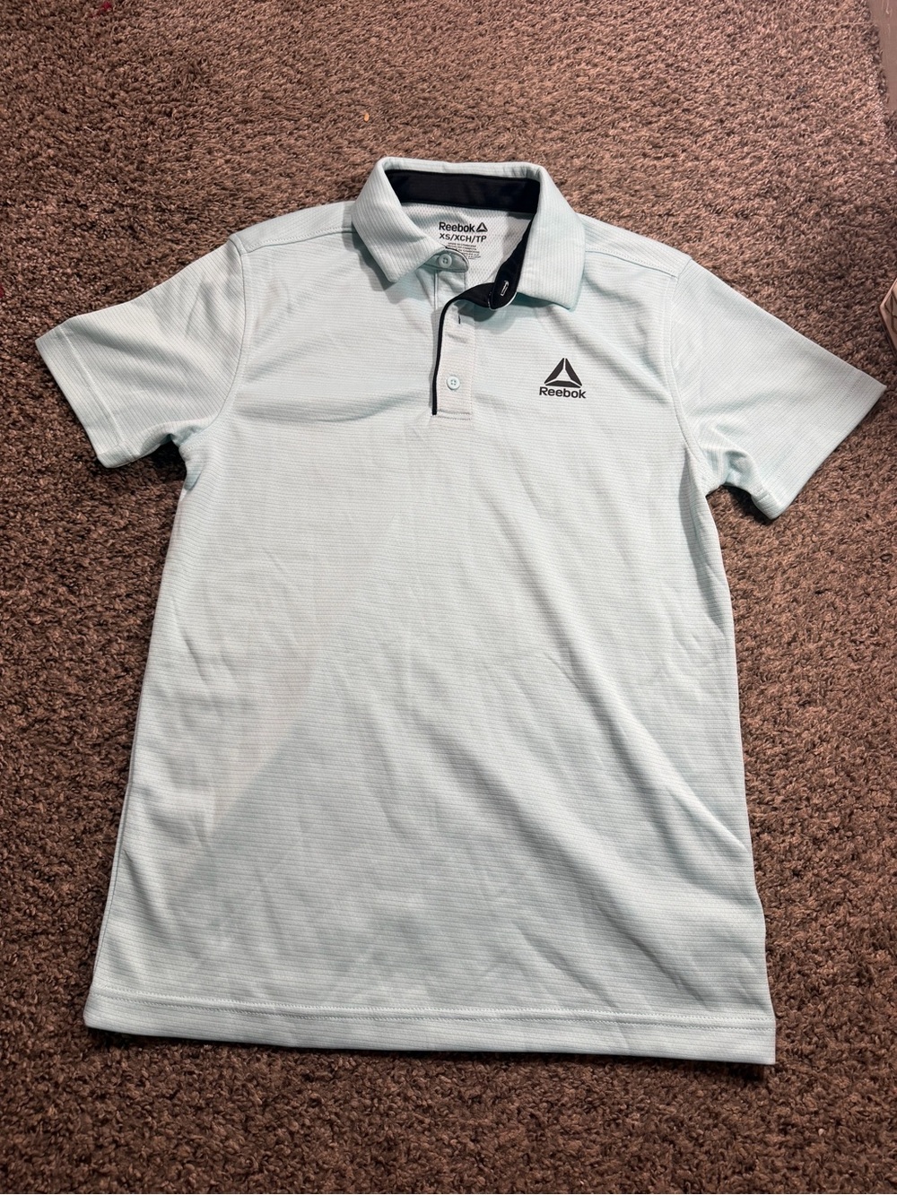 Reebok Men’s Pale Blue Performance Polo with Black Trim